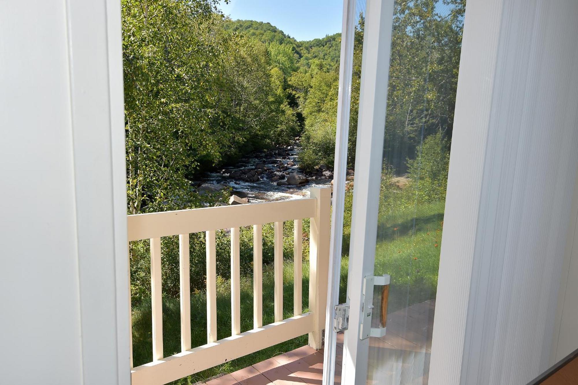 Motel Et Chalets Bo-Fleuve Evangeline Saint-Siméon Szoba fotó